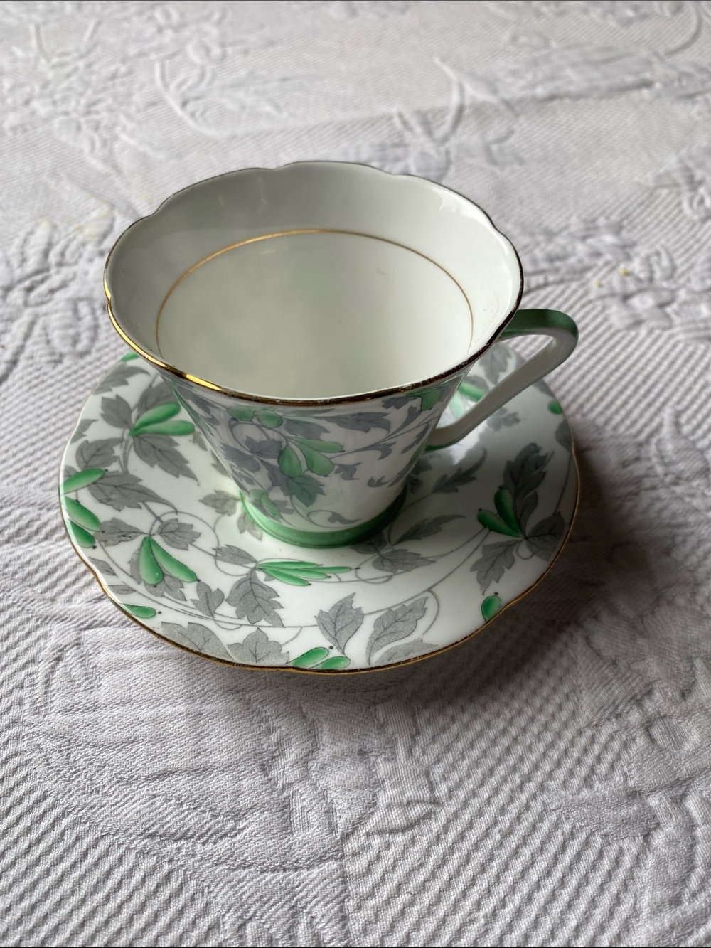 Green Leaf Porcelain Tea Cup and Saucer with Gold Trim